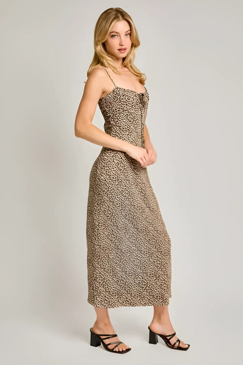 Leopard print maxi dress with thin straps and shirred neck for a boho chic look