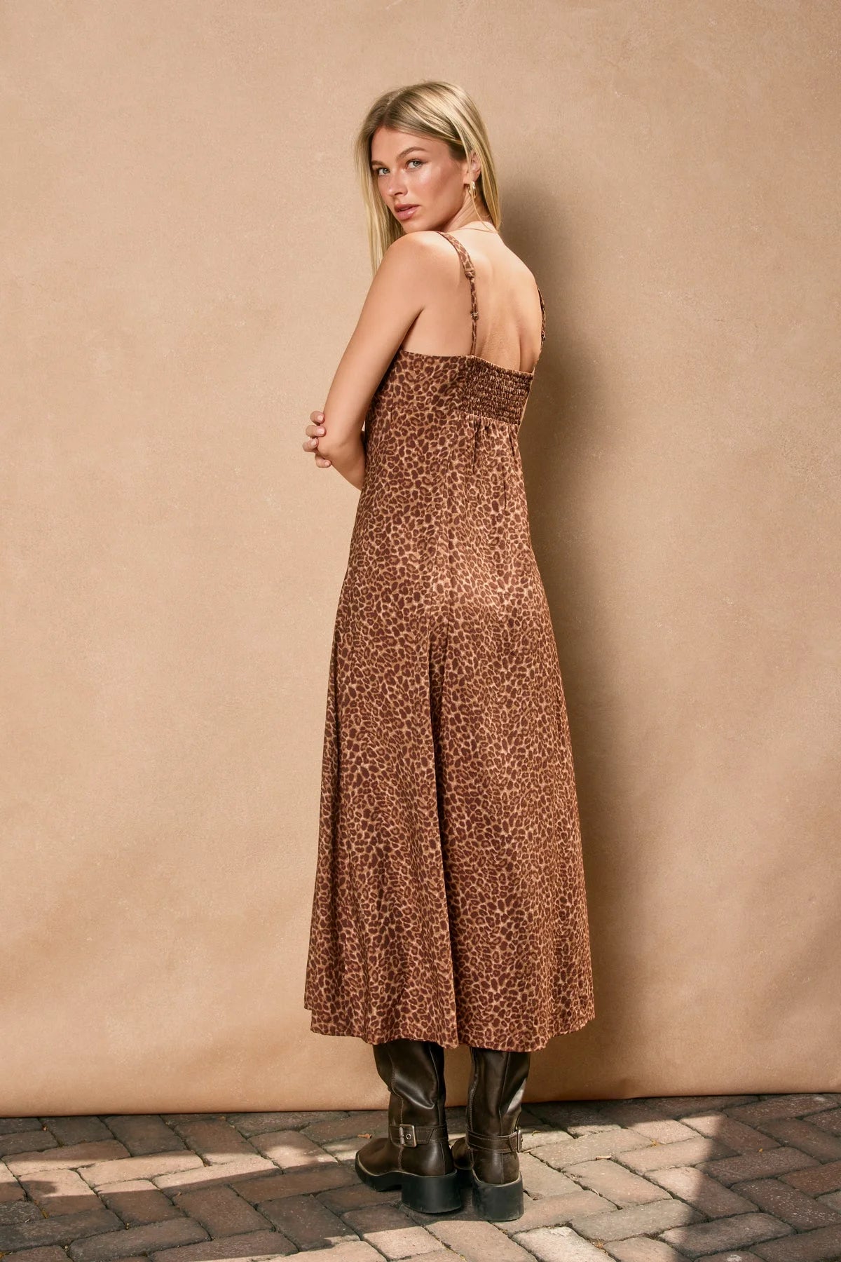 Leopard print midi dress with empire waist and black boots from Wild Baby Empire collection