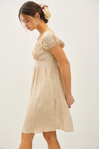 Light beige floral print mini dress with puff sleeves, ideal for women’s boho chic clothing