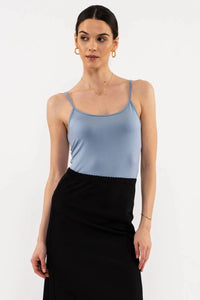 Light blue spaghetti strap camisole tank top with black skirt for women’s boho chic clothing