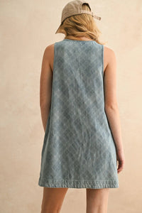 Light blue jacquard denim button front dress with subtle diamond pattern, back view