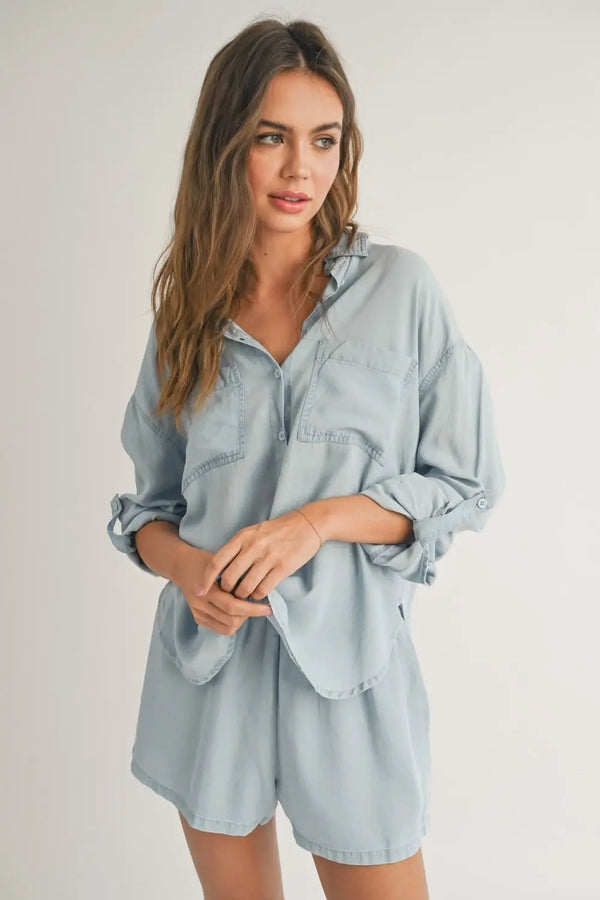 Light blue denim shorts and a Lightweight Tencel Button Down Shirt set for summer style