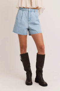 Light blue pleated high waisted denim shorts for stylish summer outfits