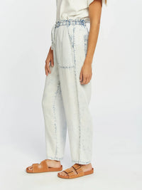 Light blue distressed Thread and Supply Nellie Pants with brown leather sandals