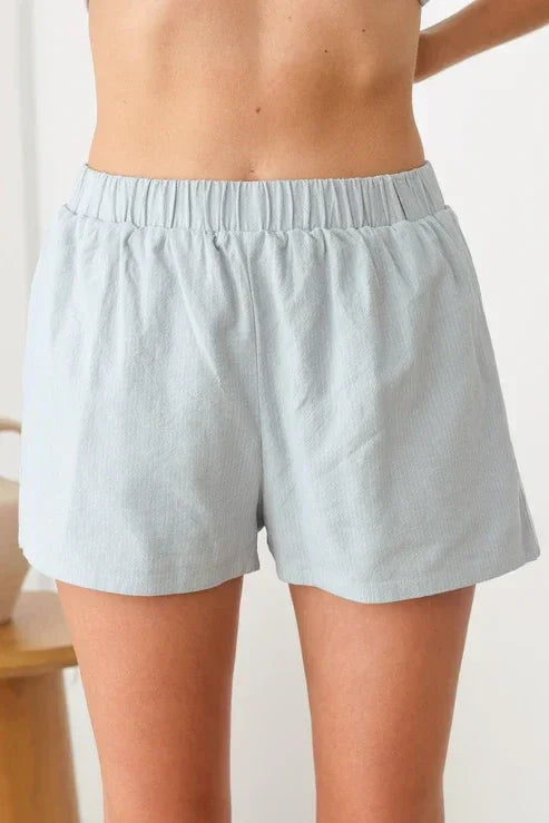 Light blue stripe pattern elastic waist line shorts for a comfortable fit