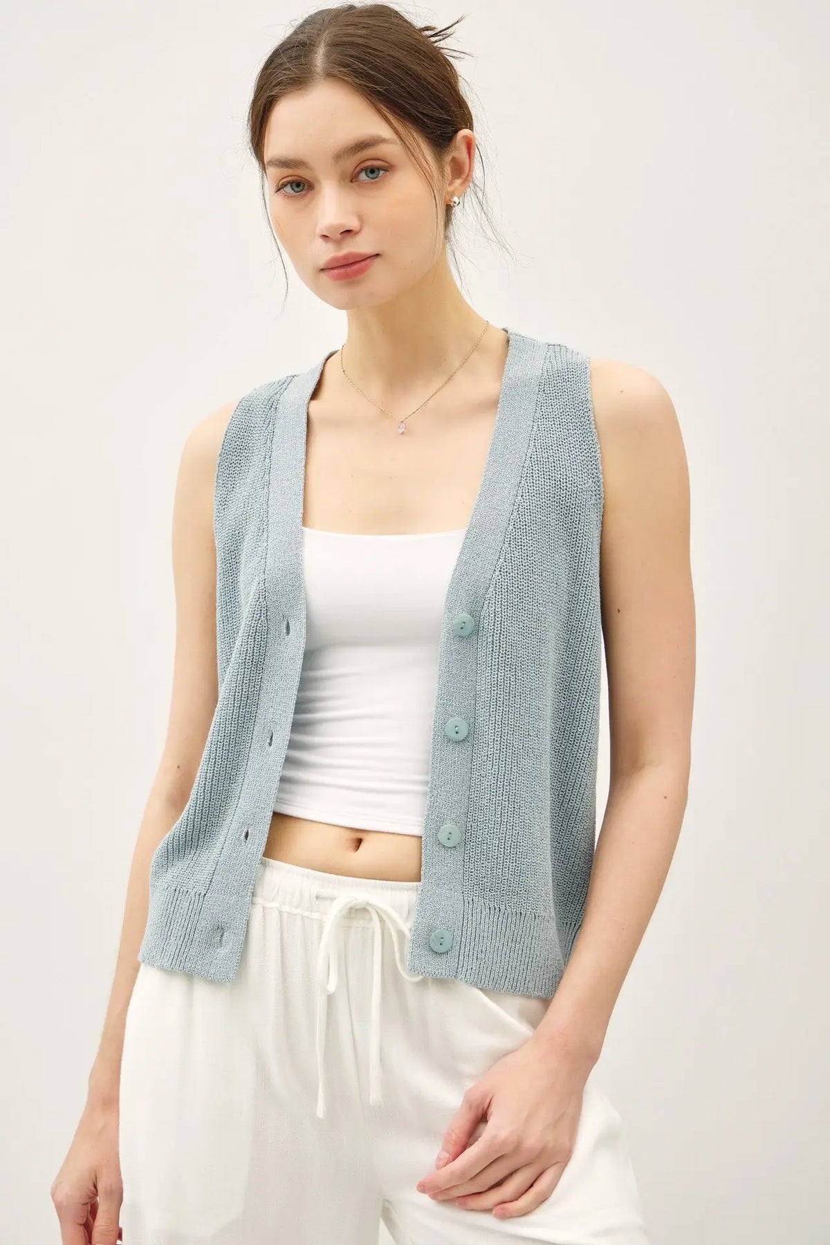 Light blue lightweight knit V-neck button-up vest, ideal for womens boho clothes and summer knit fashion