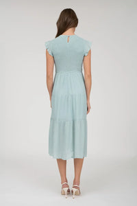 Light blue smocked tiered midi dress displayed in the SMOCKED TIERED MIDI DRESS product image