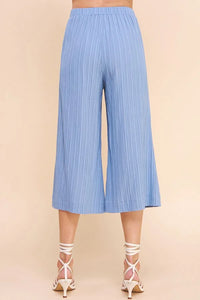 Light blue bamboo textured cropped flowy pants with pleated wide-leg design