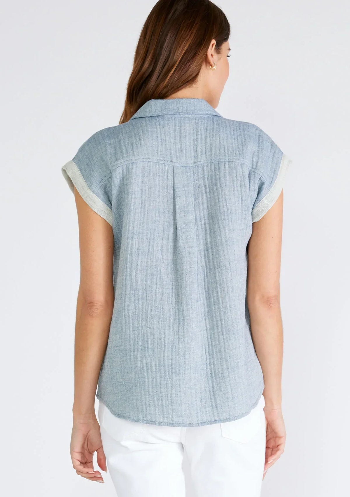 Light blue dolman sleeve button front top, flowy style shown from the back