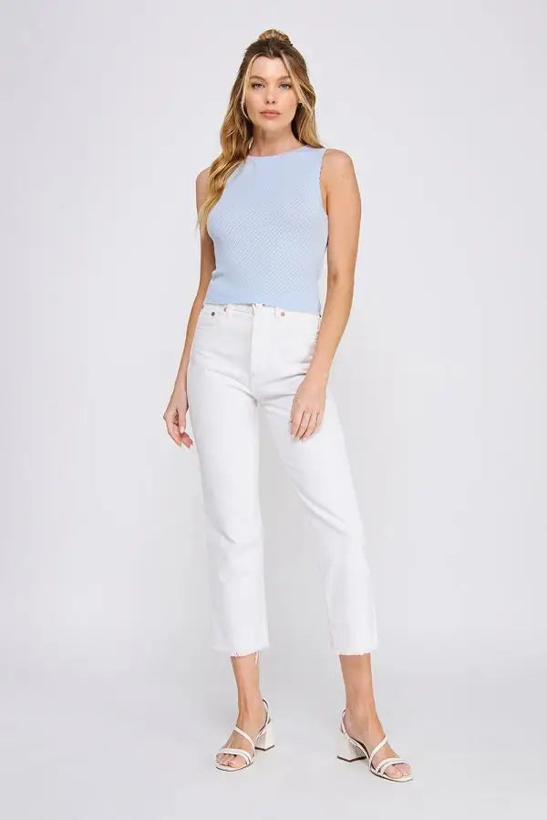 Light blue sleeveless soft scallop edges crop top styled with white cropped jeans