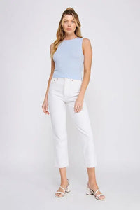 Light blue sleeveless soft scallop edges crop top styled with white cropped jeans