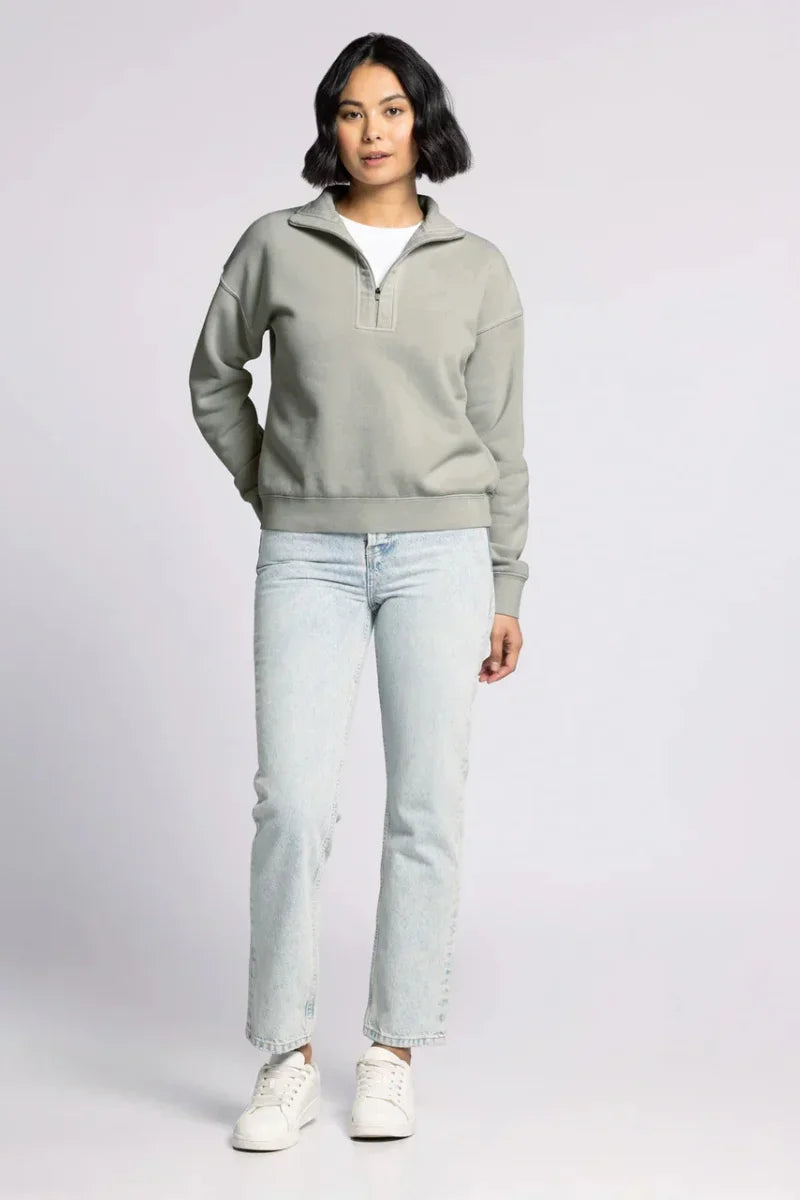 Light blue jeans with white sneakers and gray Supply Mirabel Pullover