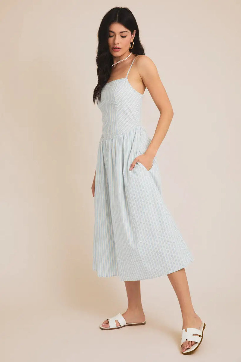 Light blue striped sundress from Shop Daisy, a stylish women’s boho chic clothing option