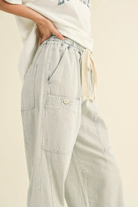Light blue striped washed barrel shape pants with pockets and cargo style design