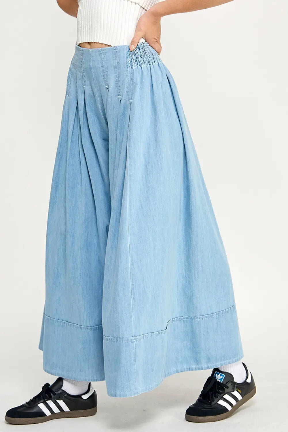 Light blue wide leg pants made from denim fabric for women’s boho chic clothing