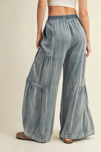 Light blue washed denim wide pants with tiered ruffles from Ruffled Side Washed Denim collection