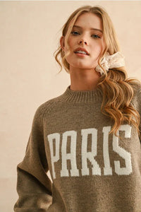 Light brown women’s boho chic clothing sweater with Paris letter across the chest at shop daisy
