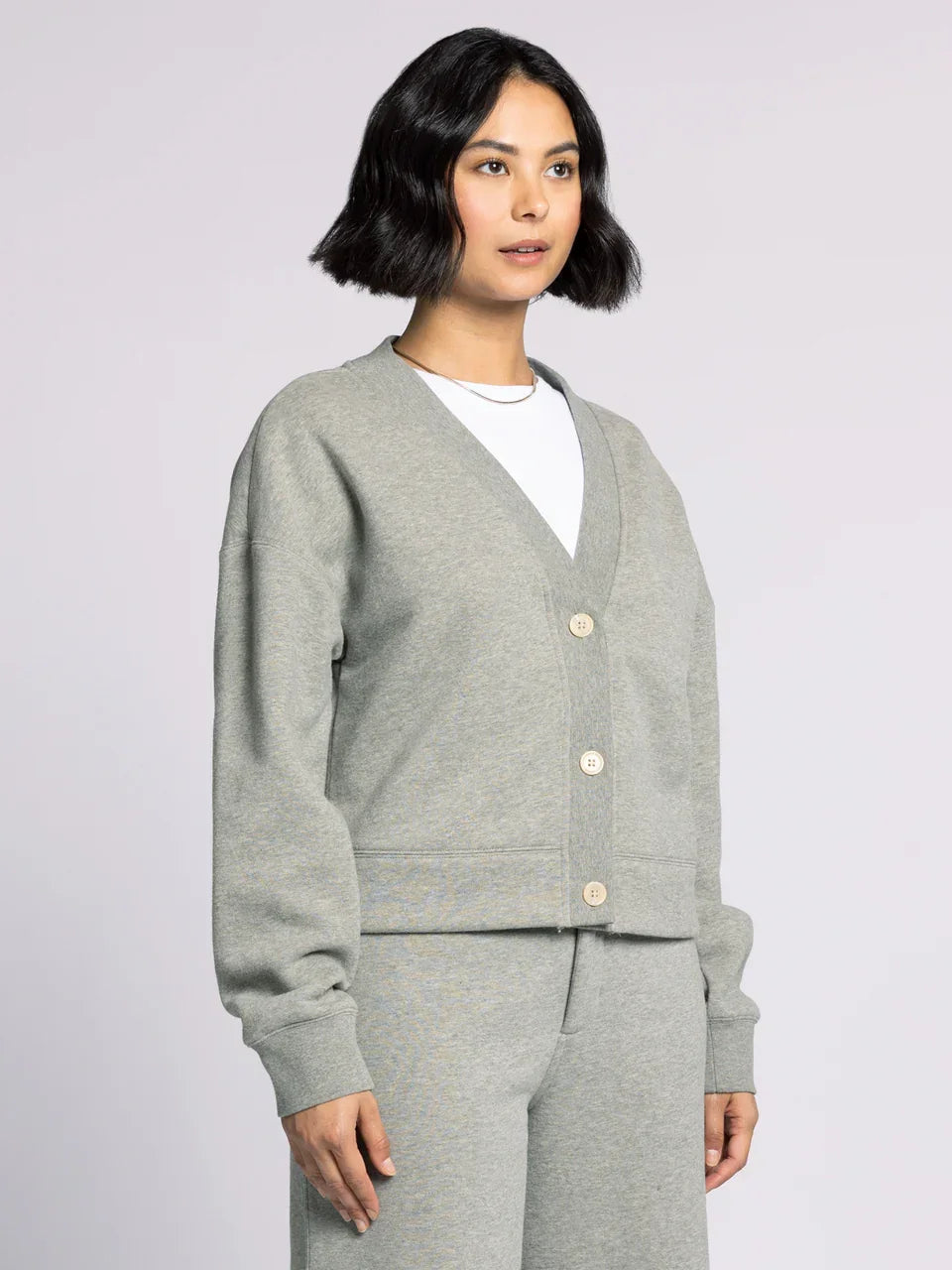 Light gray Thread and Supply Mirabel Cardigan with white buttons and V-neck