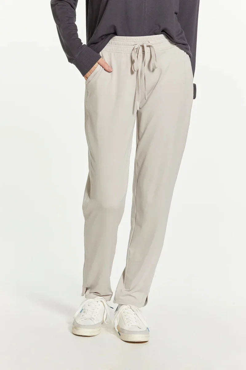 Light gray Thread and Supply Harla pants with elastic waistband and white sneakers