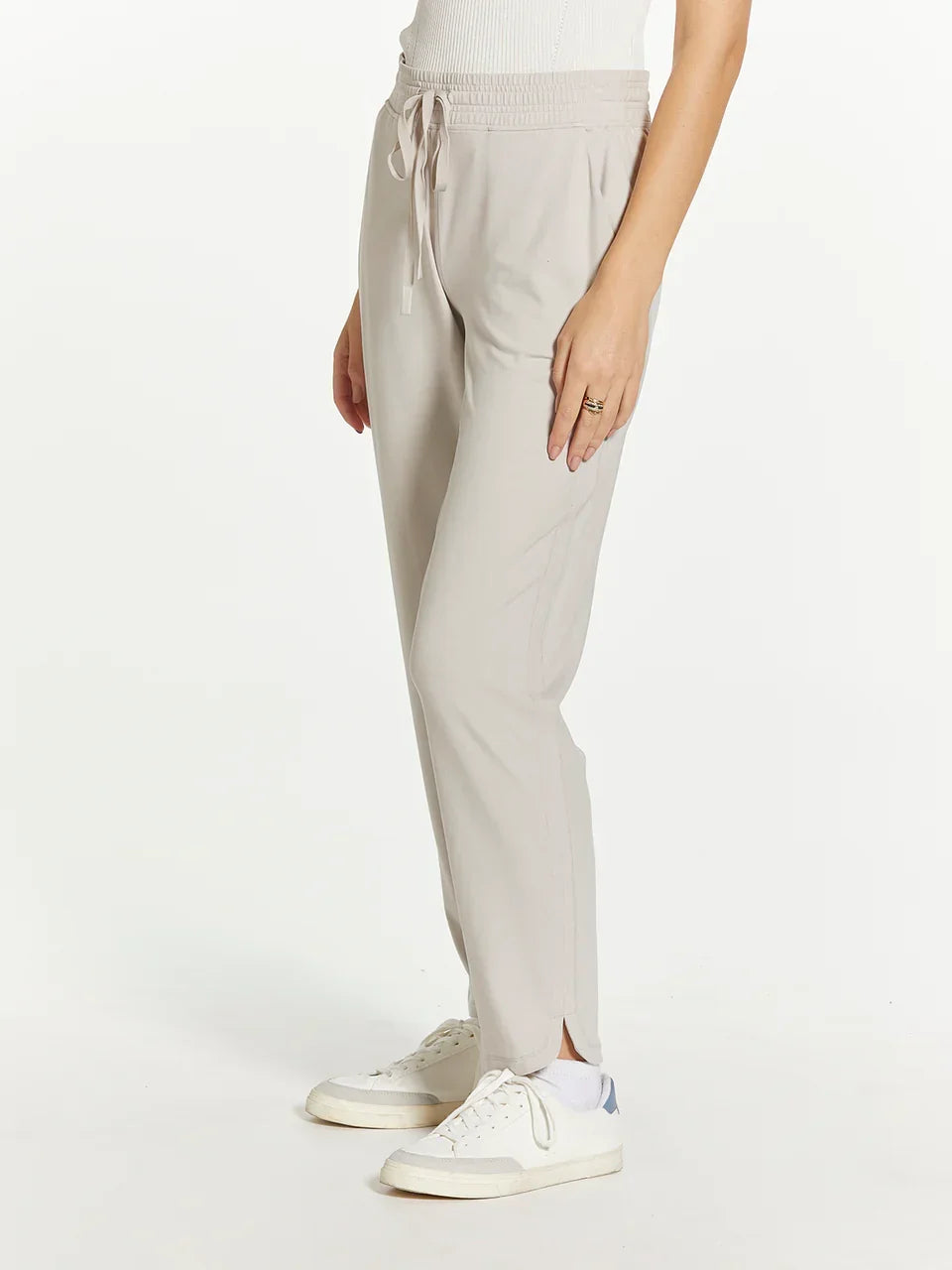 Light gray Thread and Supply Harla pants with drawstring waist and white sneakers