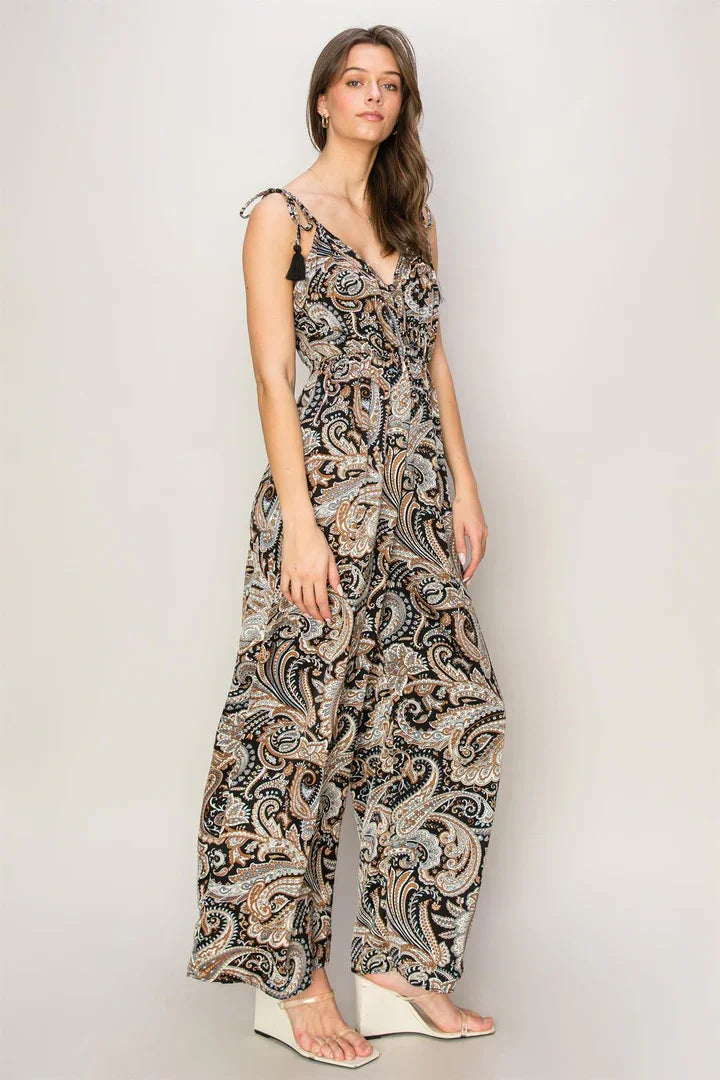 Long flowing maxi dress featuring black and beige paisley print pattern, perfect paisley print jumpsuit