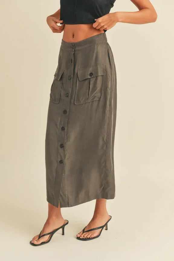 Long olive-green midi cargo skirt featuring front buttons and cargo pockets