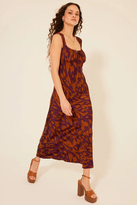 Long patterned Lucile Maxi Dress with thin straps and fitted bodice design