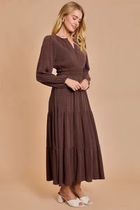 Long-sleeved brown maxi dress with tiered skirt, ideal for women’s boho chic clothing