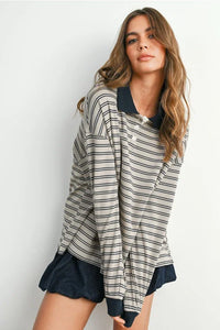 Striped collared long sleeve polo shirt in light gray and black for the Quarter-Button collection
