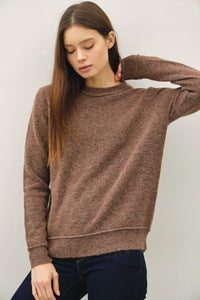 Brown long-sleeved crew neck pullover with exposed seam for a stylish look