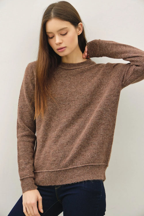 Brown long-sleeved crew neck pullover with exposed seam for a stylish look