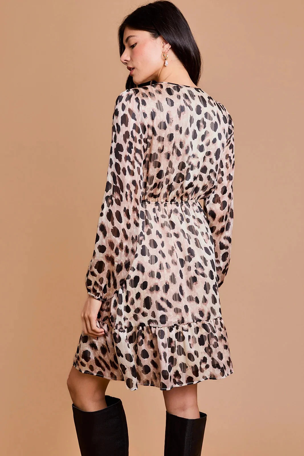 Long-sleeved animal print dress with ruffle hem and black knee-high boots from Shop Daisy