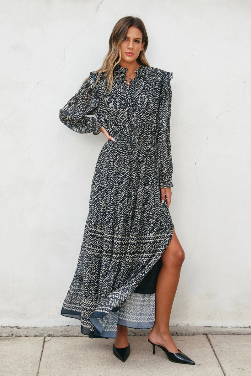 Long-sleeved patterned maxi dress from Sahara Night Maxi Dress, ideal for womens boho clothes