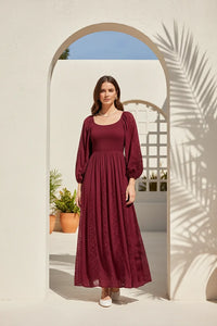 Lace inset smocked maxi dress with long sleeves, square neckline, fitted bodice, flowing skirt