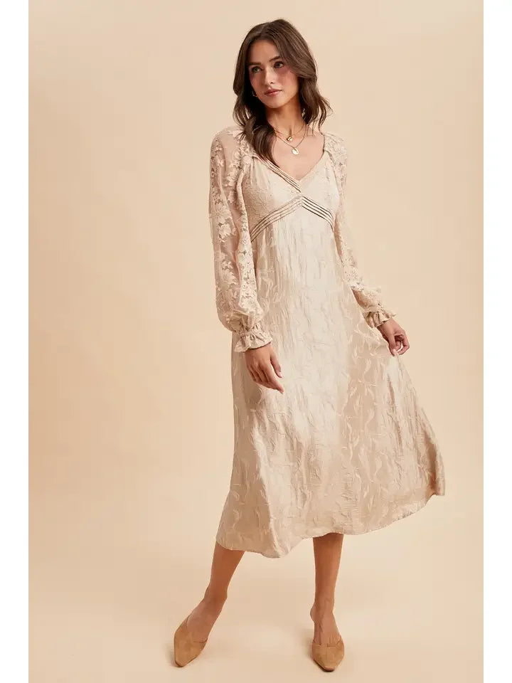 Lace Jacquard Maxi Dress featuring long sleeves, V-neck, and textured fabric design