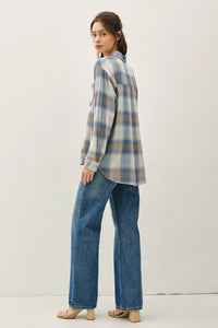 Vintage plaid boxy shirt in blue and tan with wide-leg jeans for a casual style