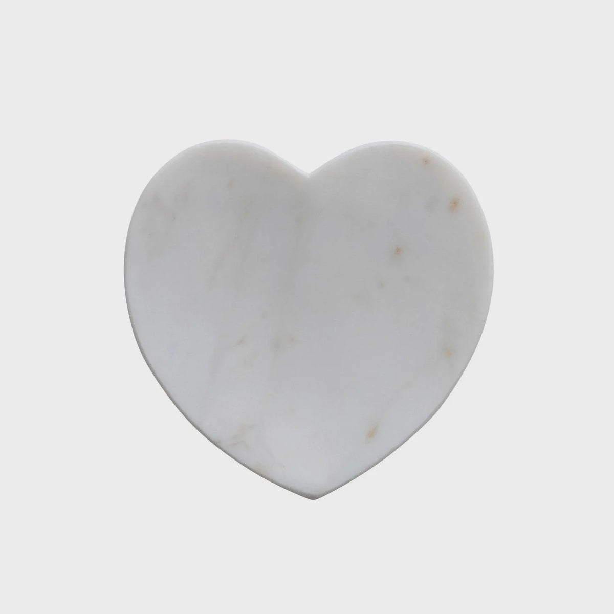 Marble heart coaster in white displayed within a Marble Heart Shaped Dish