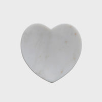 Marble heart coaster in white displayed within a Marble Heart Shaped Dish