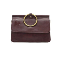 Maroon leather ARIA RING BAG with gold ring handle showing widest point and interior zip