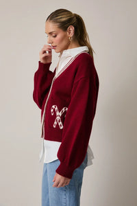 Maroon and white candy cane graphic cardigan with varsity embroidery