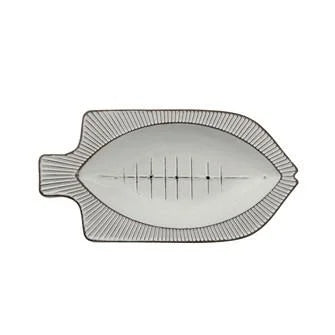 Metal Fish Dish featuring a metal fish shaped object with decorative lines