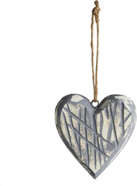 Metal heart ornament with etched lines for women’s boho chic clothing from Shop Daisy