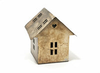 Rustic bohemian metal house model with heart window and weathered texture