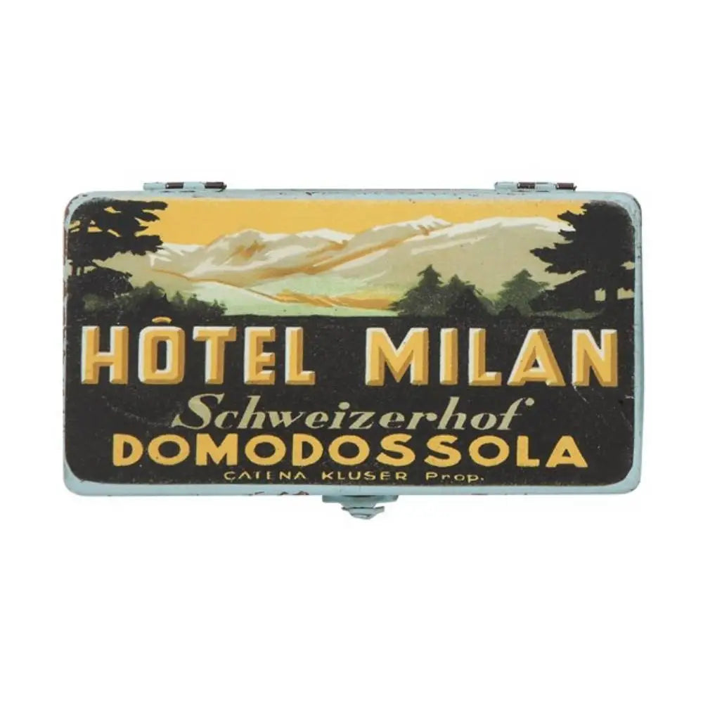 Vintage decorative metal lunch box featuring a mountain scene from Hotel Milan