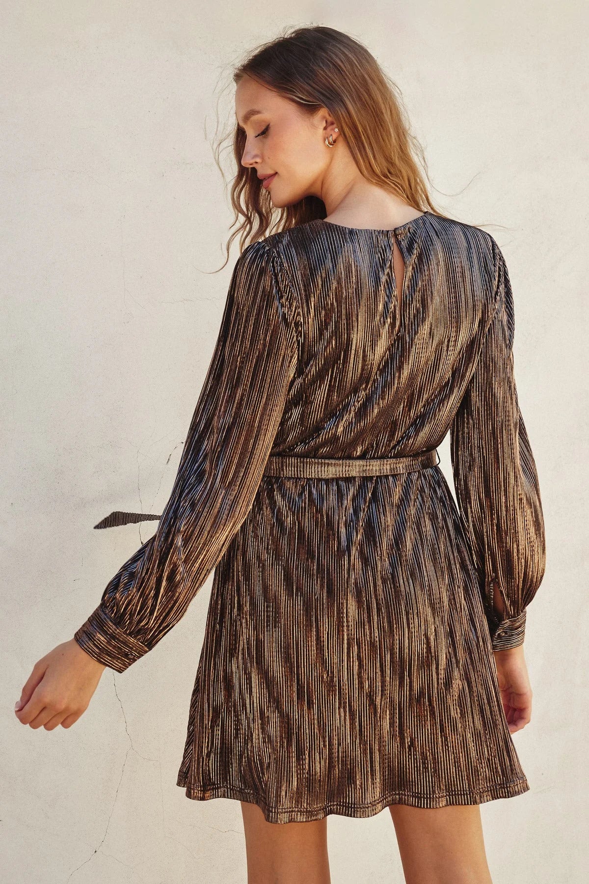 Metallic pleated mini dress with long sleeves and belted waist from Shop Daisy