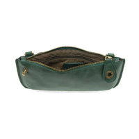 Mini leather clutch in green featuring the Lux Crossbody Wristlet design