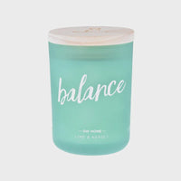 Mint-colored neroli candle with wooden lid, emitting a zesty fragrance for relaxation