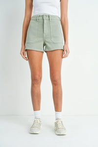 Mint green high-waisted utility cargo short with front utility pockets for versatile style