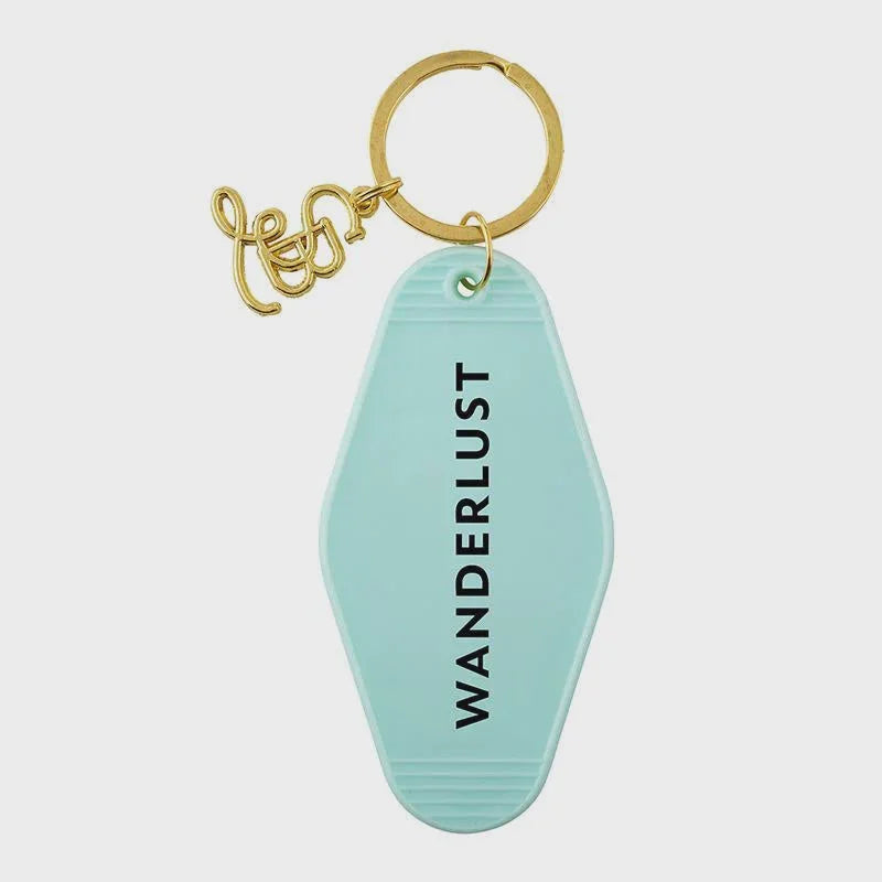 Mint green wanderlust motel style key chain tag with love charm on a gold key ring