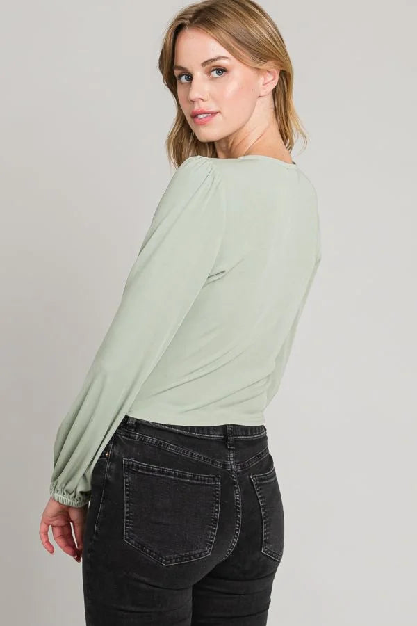 Mint green long-sleeved CENTER RUCHED MICRO-RIB KNIT TOP with dark denim jeans, shop Daisy